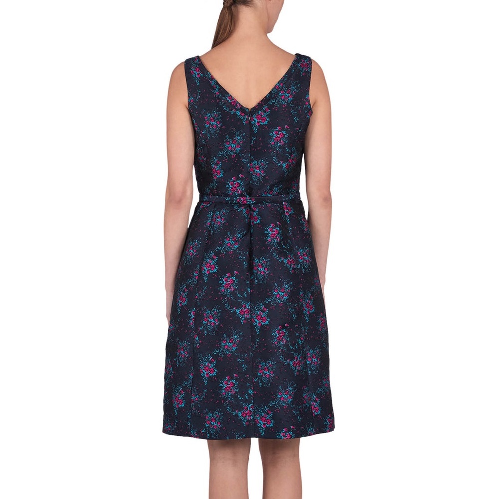 This is a pretty jacquard dress. An elegant sheath with a skinny belt.